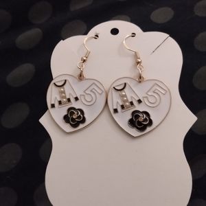 White/black charm earrings